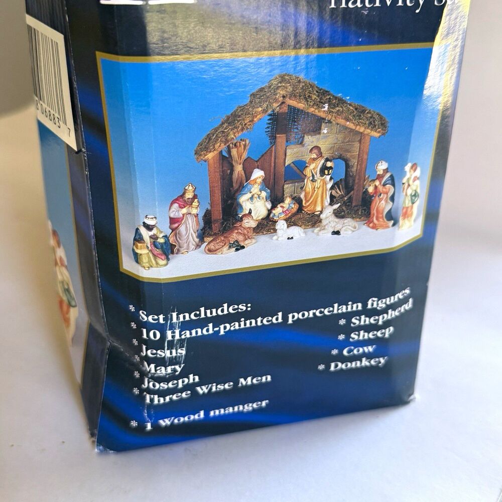 10-Piece Hand-Painted Porcelain Nativity Set w/ Wood Manger (a sheep is missing)